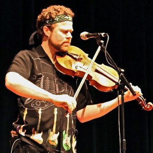 Dr. David Wallace performing at The Bell Center Rock violist David Wallace DocWallaceMusic
