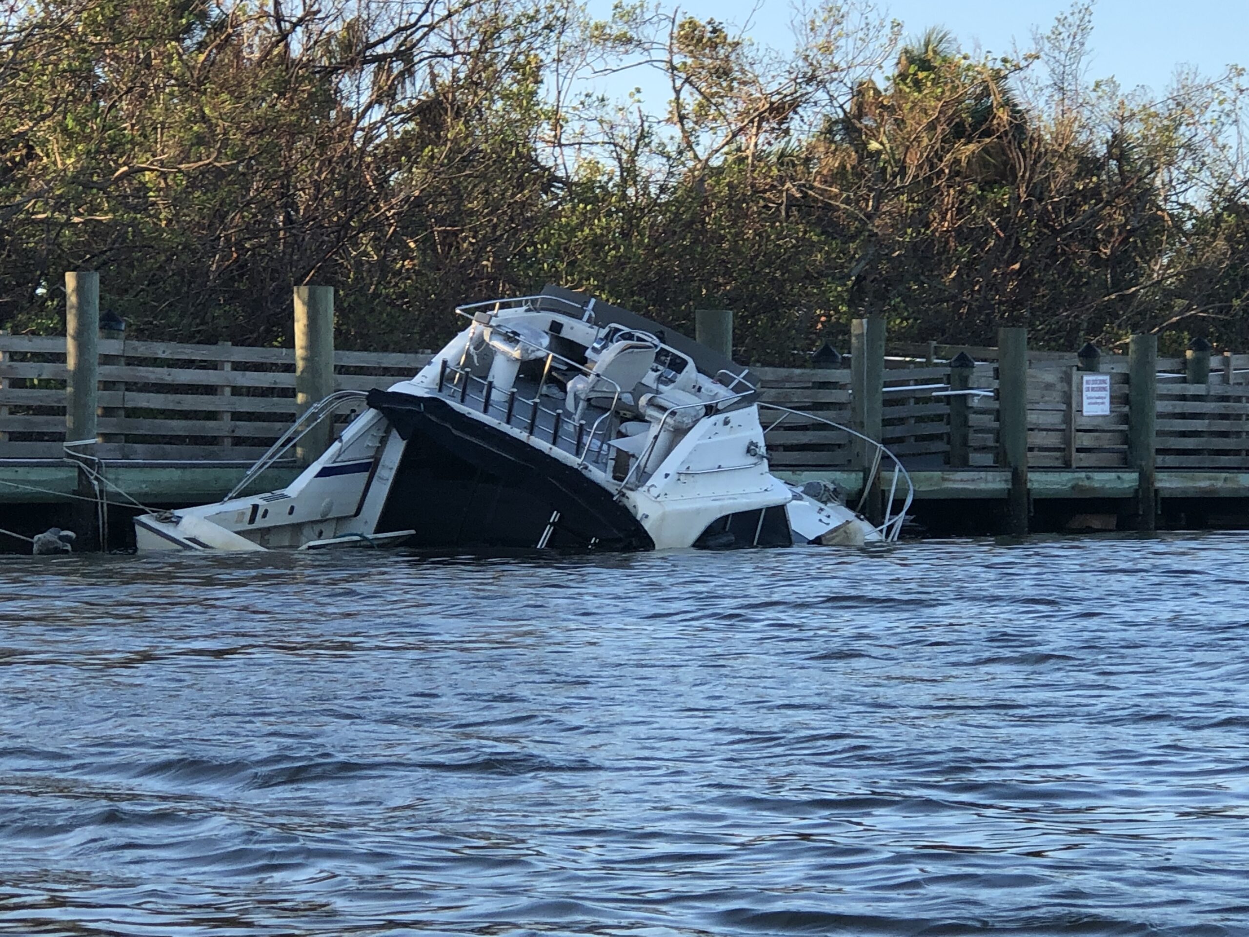 Partly submerged and shipwrecked boat in the Florida Keys