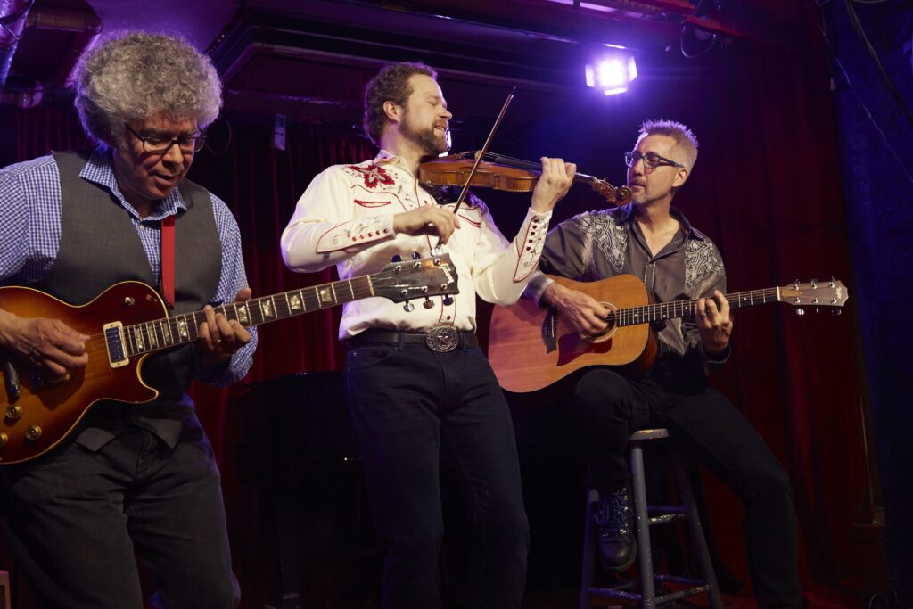 David Wallace, violin; Daniel Levy, Acoustic Guitar; Dana Scofidio, electric guitar performing in concert. The trio will perform a benefit concert for Hour Children, Inc.